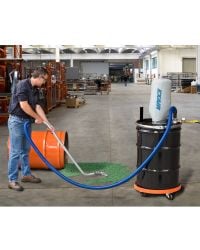 The Heavy Duty Dry Vac cleans up a spill of tumbling media.